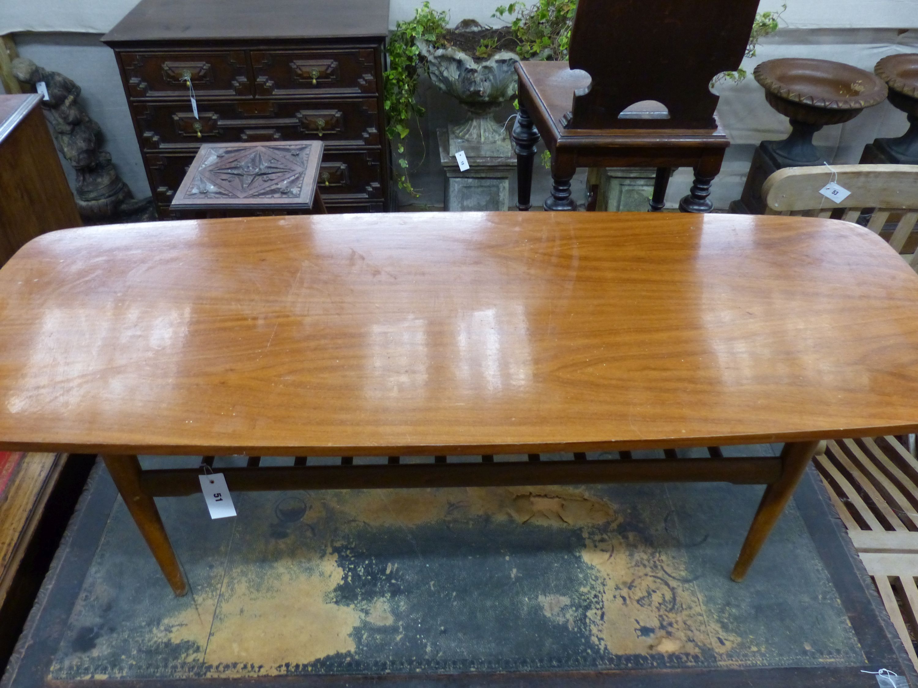 A 1960's teak coffee table, width 137cm